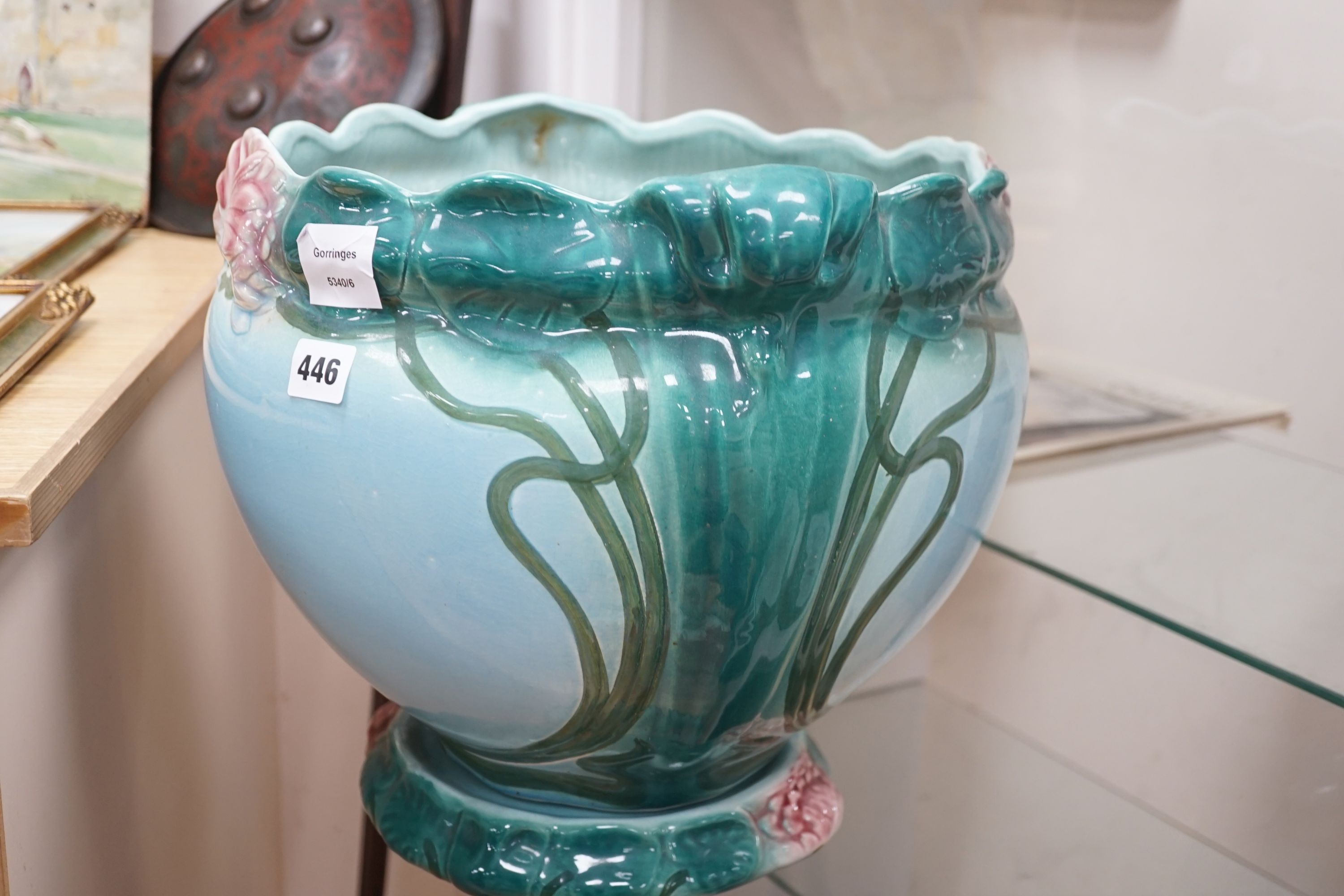 A Staffordshire pottery jardiniere on stand., 91 cms high.